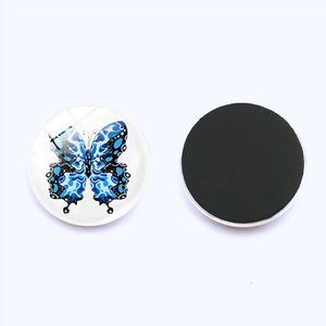Detailed front and back view of 25mm blue butterfly glass fridge magnet with magnetic backing
