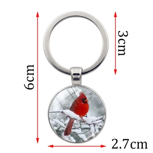 Silver Northern Cardinal bird glass pendant keychain with dimensions 6cm x 3cm x 2.7cm