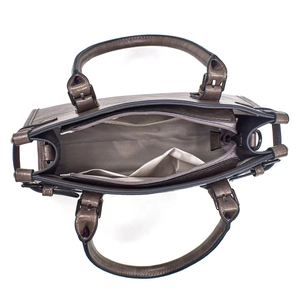 Detail view of the spacious handbag interior with a zip pocket and two open organizer slots