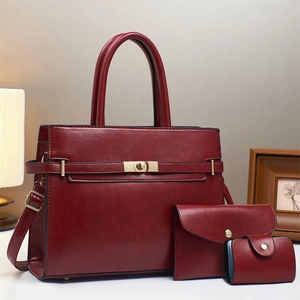 Three-piece set burgundy textured leather tote bag with matching wallet and card holder