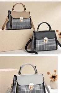 Close-up of stylish plaid handbags with leather trim and gold twist lock closure