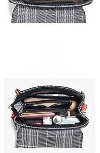 Detail of classic houndstooth handbag featuring spacious interior compartments and zipper pocket
