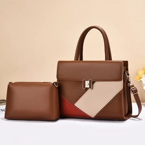 Brown multi-tone patchwork leather handbag with gold H-buckle and matching small clutch