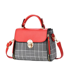 Classic plaid handbag in red and black-white contrast with golden twist lock