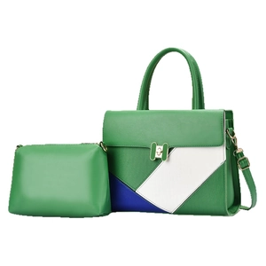 Borsa a mano verde color-block con motivi geometrici e chiusura in metallo oro