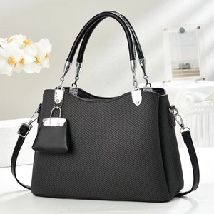 Deep grey woven texture handbag with silver hardware and adjustable shoulder strap