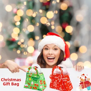 Detailed view of red and green Christmas non-woven gift bags with festive patterns