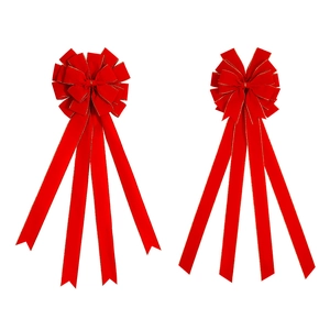 Set of large red velvet Christmas bows with gold trim for festive holiday tree decoration