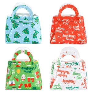 Set of four colorful Christmas felt gift bags with Santa and tree patterns