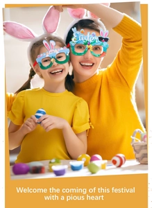 Detail view of festive Easter themed glasses with rabbit and egg decorations for party props