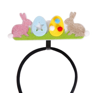 Paashaas hoofdband voor kinderen met kleurrijke glittereieren en groen vilt gras