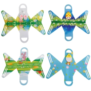 Detail of four colorful Easter DIY gift bags with cartoon chick, rabbit and egg designs
