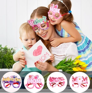 Detail view of Mother's Day paper party glasses with floral designs and festive text