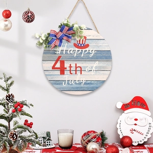 Independence Day round wooden welcome sign with blue white stripes and floral bow