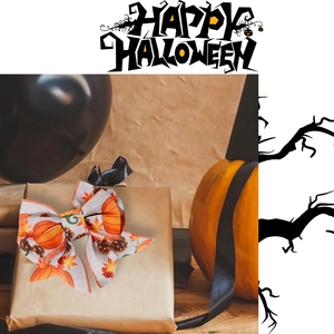 Detail of Halloween faux linen ribbon bow featuring pumpkin, maple leaf and pinecone prints