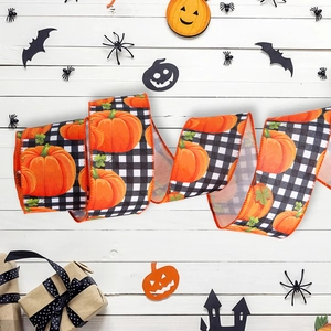 Halloween wired ribbon with pumpkin patterns on black and white checkered background