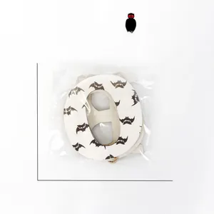 Detailed view of Halloween wood 'O' letter sign with bat pattern and 15cm size markers