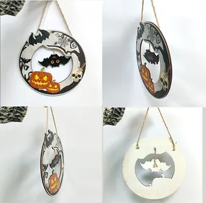 Detail of wooden Halloween door sign showing rope hanger and swinging bat element