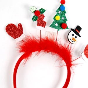 Christmas headband with red feathers and glitter motifs like snowman and Xmas tree