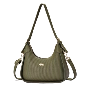 Minimalist dark green hobo shoulder bag with textured leather and golden bow detail