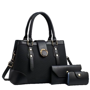 Black striped 3-piece bag set with tote, clutch and wallet featuring gold hardware detail