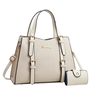 Elegant beige woven texture handbag set with gold hardware and adjustable strap
