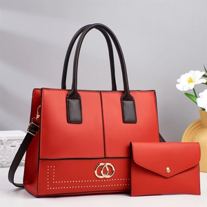 Rote minimalistische PU-Lederhandtasche mit braunen Griffen und Goldbeschlägen