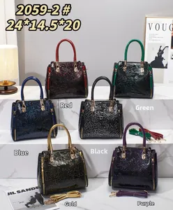 Close-up of embossed floral textured handbags in six glossy patent leather colors