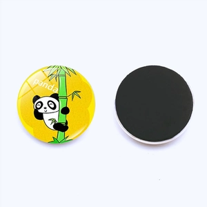 Detailed view of 25mm panda glass fridge magnet showing colorful front and magnetic back