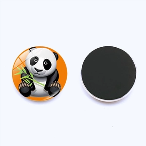 Close-up of a 25mm glass panda magnet with creative cartoon illustration on a white background
