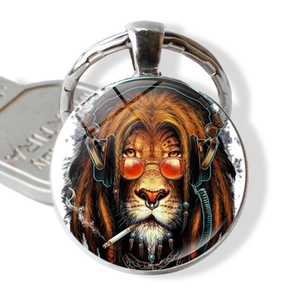 Macro shot of silver metal keychain featuring hip-hop lion glass dome artwork