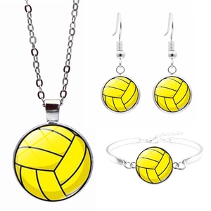 Detailed set of silver volleyball jewelry featuring yellow pendants and glass texture