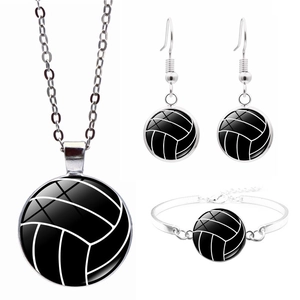 Detail view of a sports jewelry set featuring a volleyball pendant necklace, earrings, and bracelet