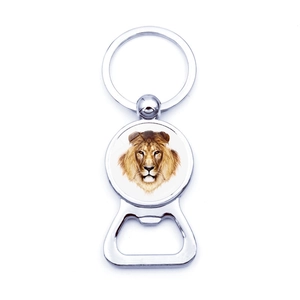 Detailed view of silver lion head metal keychain with integrated bottle opener tool