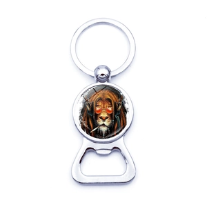 Close-up of a silver lion head key ring with a functional bottle opener feature