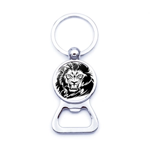 Close-up of metal lion head key ring with integrated bottle opener tool on white background