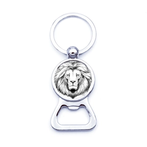Macro view of lion head illustration on metal bottle opener keychain pendant