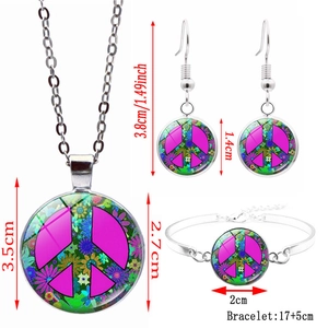 Bohemian peace sign jewelry set with pink floral glass pendant necklace, earrings and bracelet