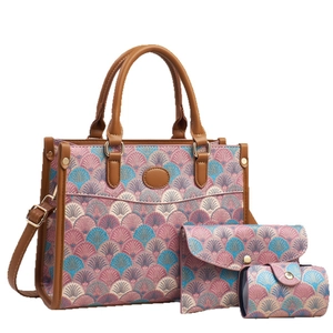 Three-piece tote bag set with geometric fan patterns and brown leather-like trim