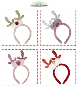 Detail showing four plush Christmas reindeer headbands in beige, purple, pink and red colors