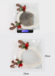 Christmas antler headband details showing 24cm by 20cm size and 19.5g lightweight scale