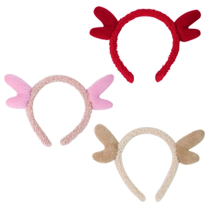Three plush reindeer antler headbands in red, pink, and brown for Christmas parties