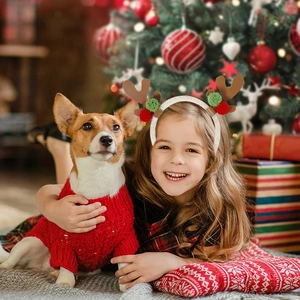 Festive Christmas reindeer antler headband with colorful pom-poms for holiday parties