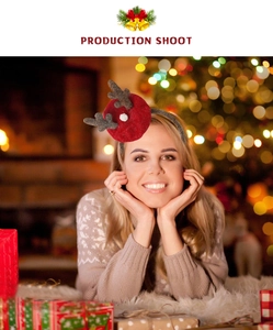 Close-up of plush brown reindeer antlers on a red Christmas headband for party decor