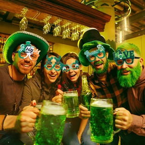 St. Patrick's Day green clover glasses and party hats set for Irish parade celebration