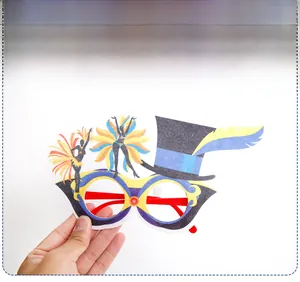 Close-up of Carnival party glasses featuring feather decor and a blue striped top hat