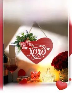 Close-up of red heart door sign with XOXO text and ribbon for Valentine's Day decor