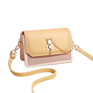 Macaron pastel crossbody bag with cat-shaped gold hardware and dual-tone patchwork design