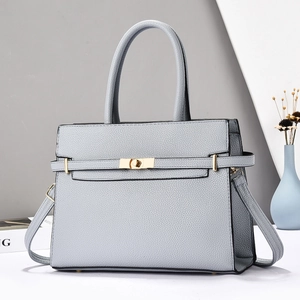 Litchi pattern light blue handbag with gold lock and adjustable shoulder strap