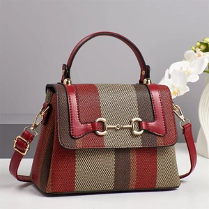 Vintage style large canvas tote bag with red stripes and gold metal hardware